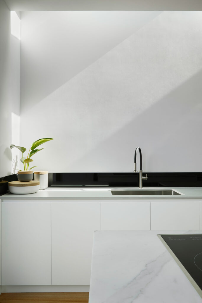 Maike Design white kitchen, inset sink and skylight