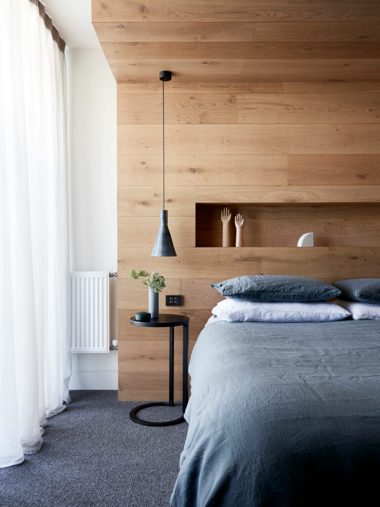 Maike Design bedroom, timber bedhead wall with storage