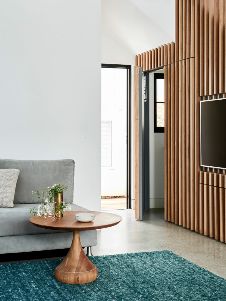 Maike Design batten wall with concealed laundry door