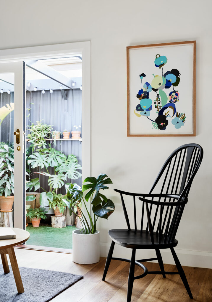 Maike Design lounge opening onto courtyard garden