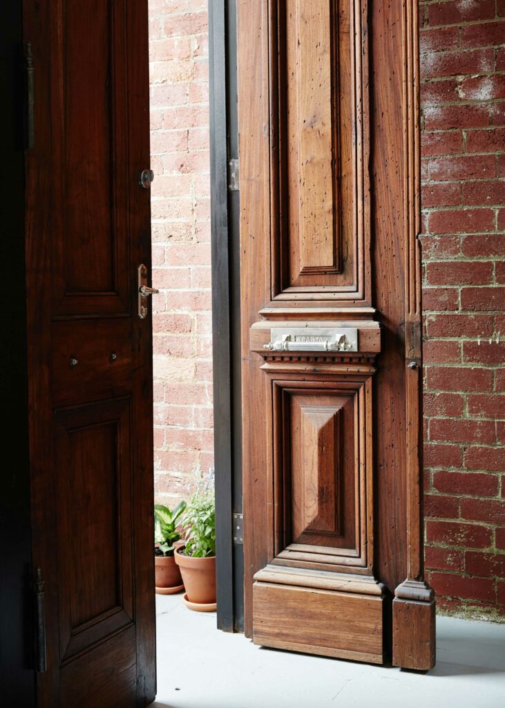 Maike Design Creative workspace, warehouse conversion. Antique entry doors