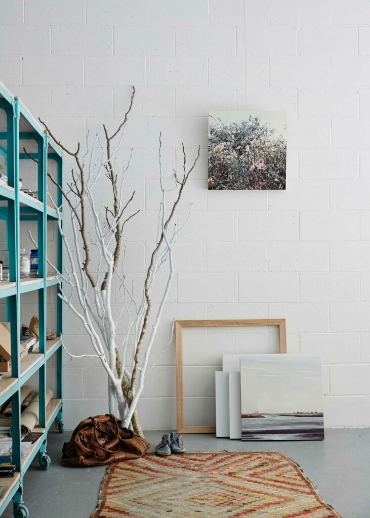 Maike Design Creative workspace, warehouse conversion. Painting studio, coloured rug and frames