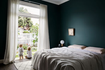 Maike Design single family home multi generational living. Linen sheets and artwork.